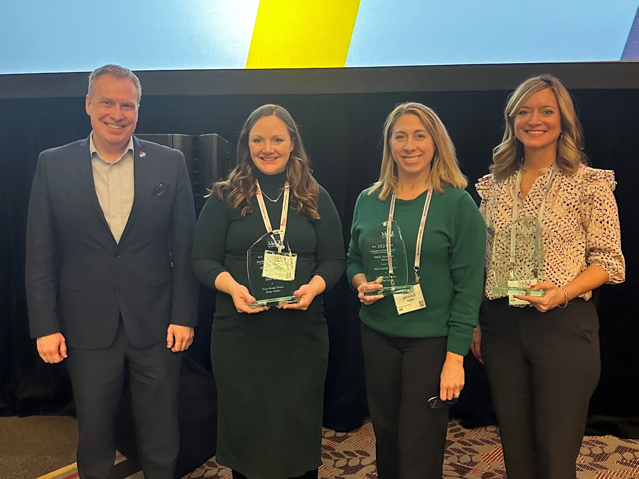 Receiving the award are John Mullen, AICP, McCormick Taylor; Jessica Pilarski, SHA; Jennifer Regina, McCormick Taylor; and Virginia (Ginny) Collier, PE.